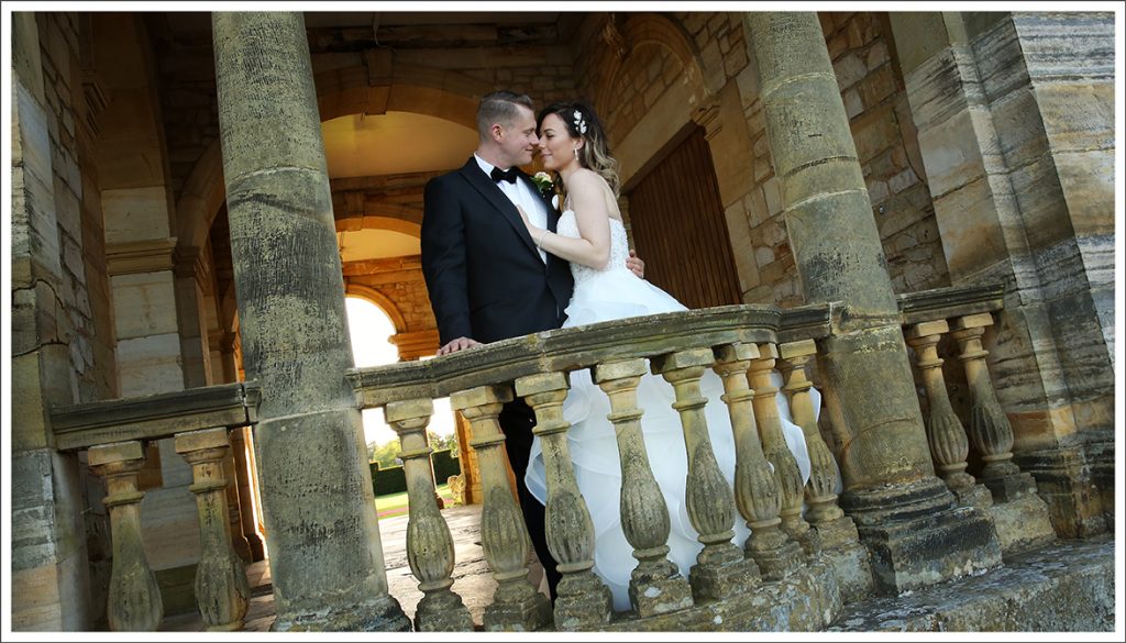 Bride & Groom at lake at Hever Castle