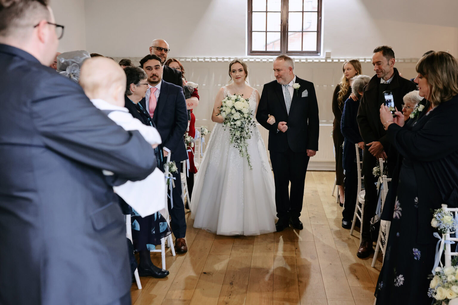 Emotional ceremony during a February wedding celebration at Highley Manor