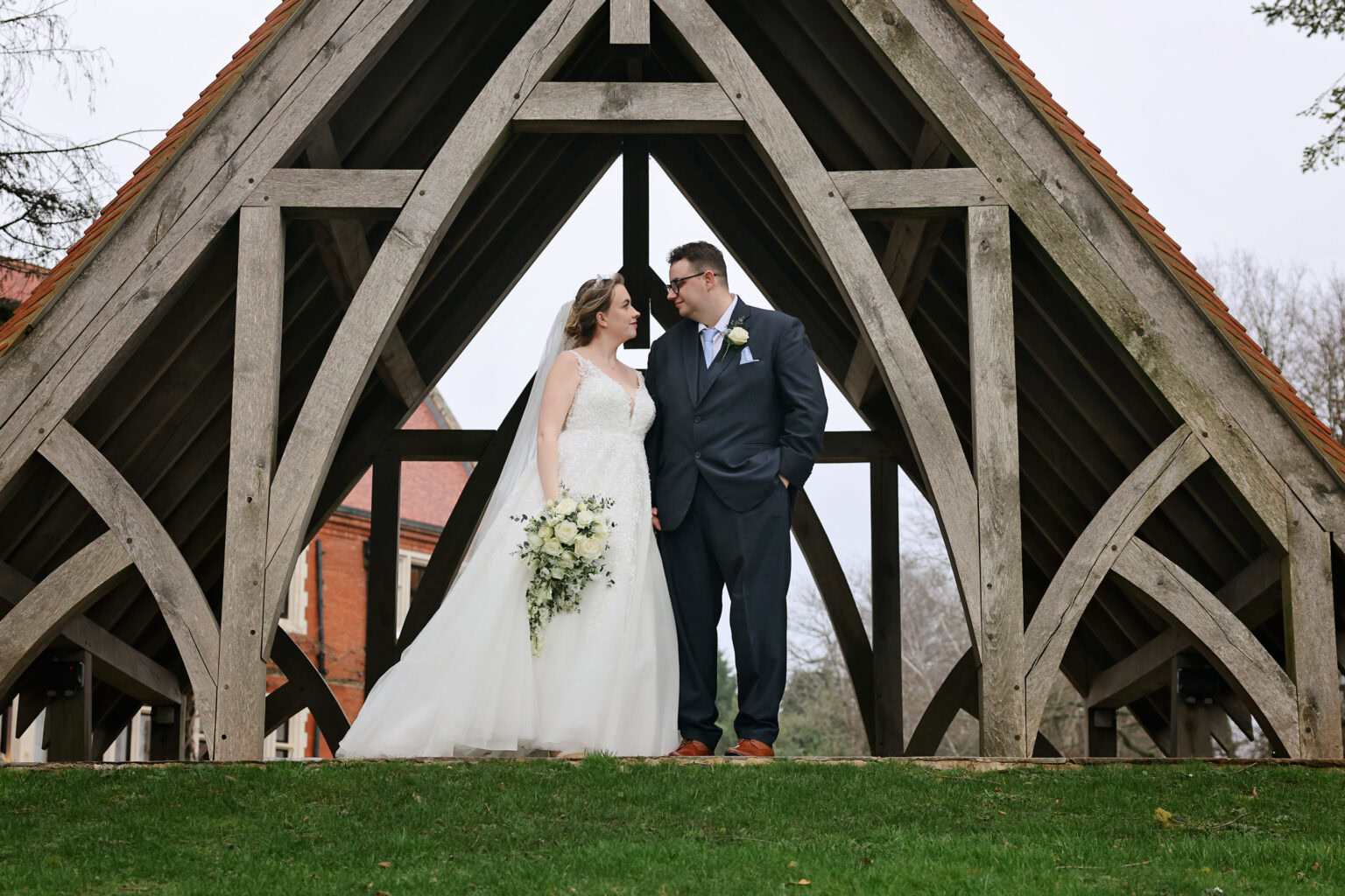 Romantic winter couple portrait in the gardens at Highley Manor