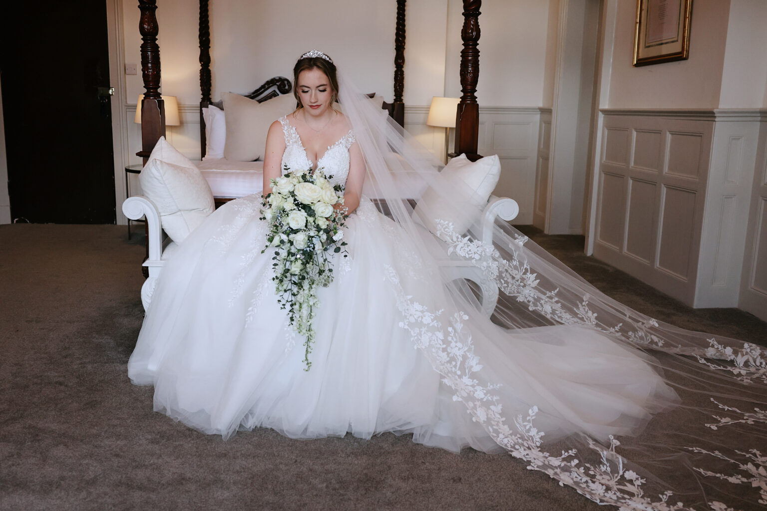 Bride getting ready on a February wedding morning at Highley Manor in Sussex