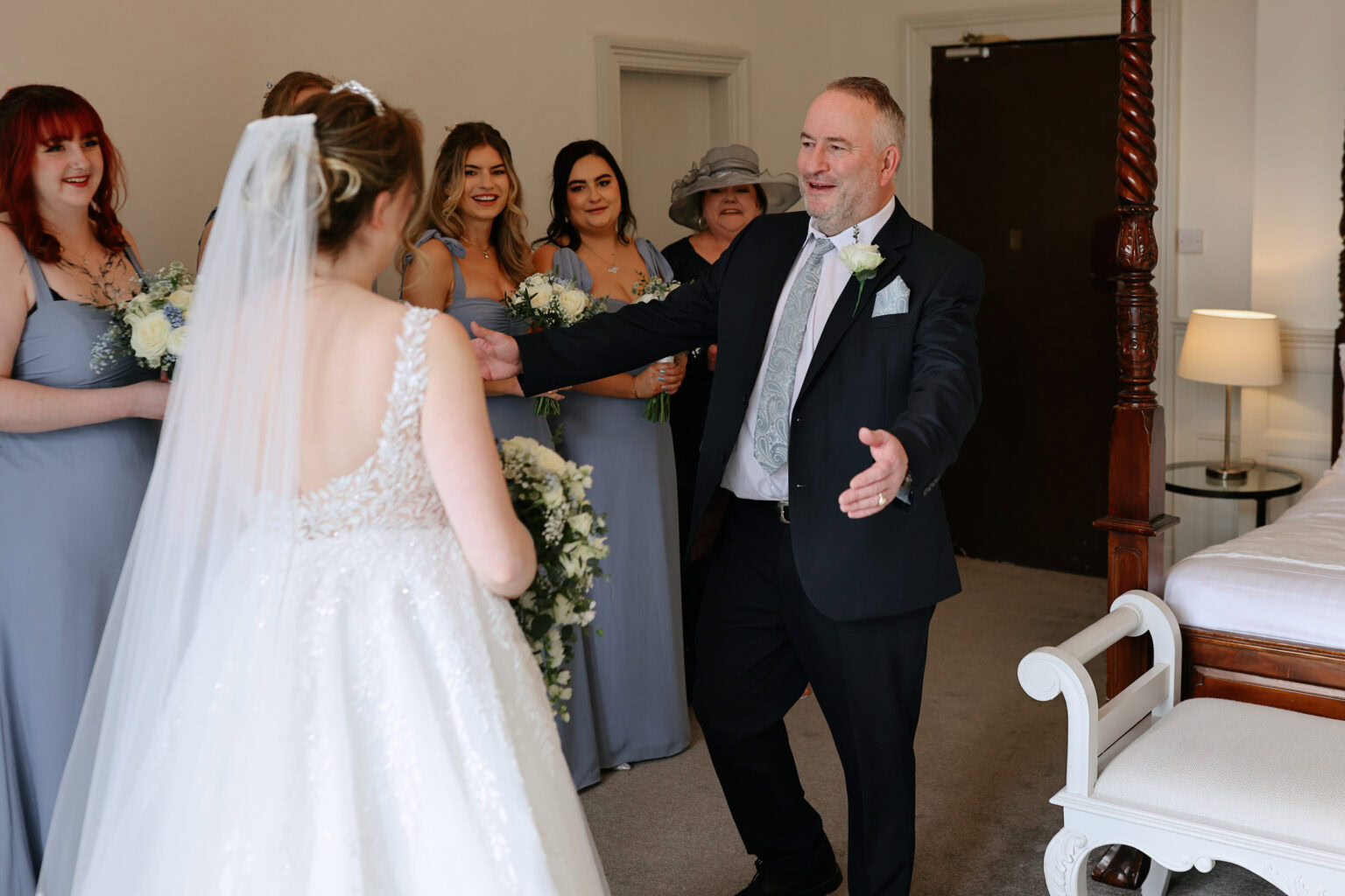 Bride dress reveal ready on a February wedding morning at Highley Manor in Sussex